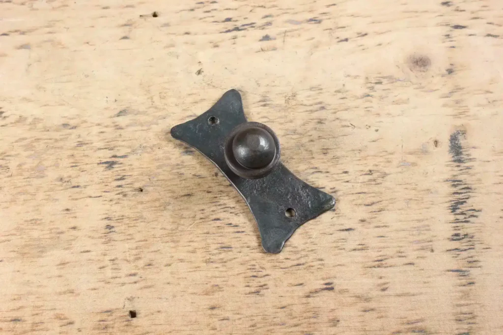 Bouton fer forgé