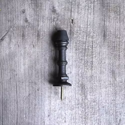 black-vintage-cast-iron-door-stopper